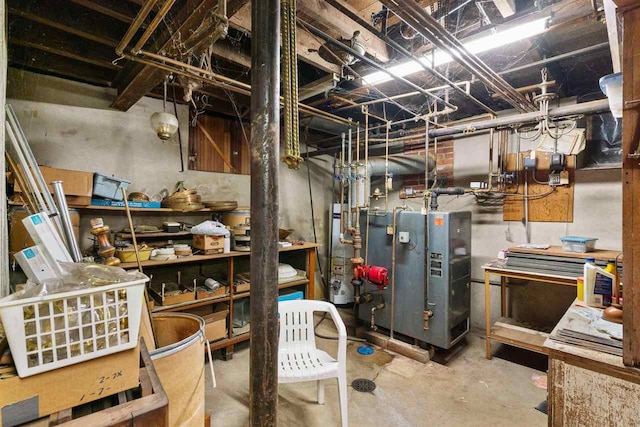 utility room featuring water heater