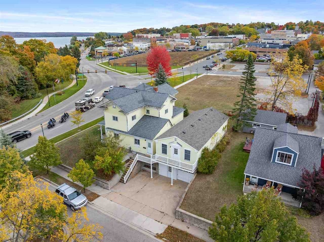 drone / aerial view with a water view