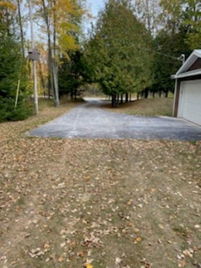 view of yard featuring a garage