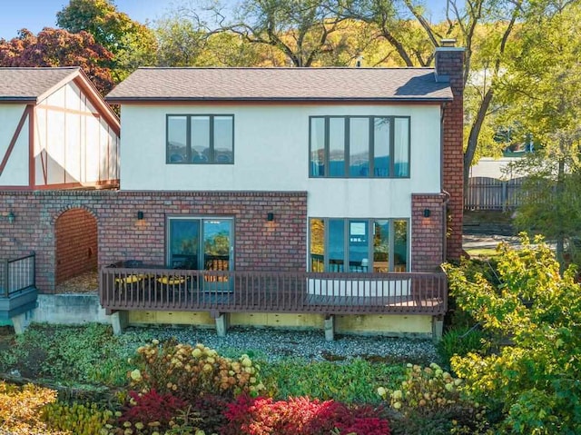 rear view of house with a deck