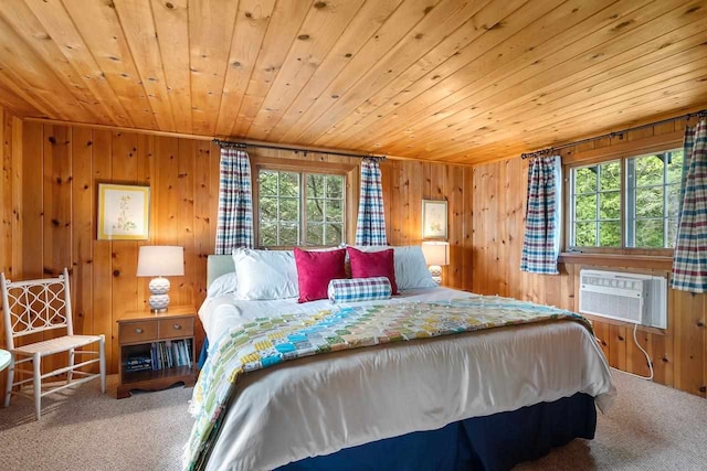 carpeted bedroom with wood ceiling, wooden walls, and a wall unit AC