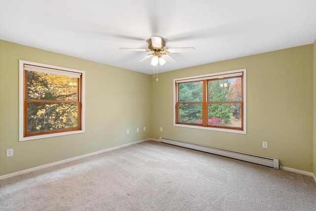 unfurnished room with ceiling fan, carpet, and a baseboard radiator