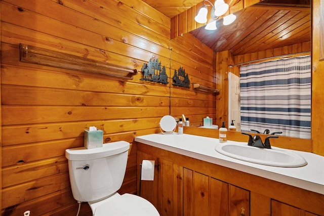 bathroom featuring wood walls, a shower with shower curtain, toilet, wooden ceiling, and vanity