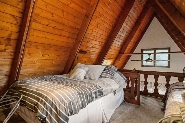 unfurnished bedroom with carpet flooring, wood walls, wooden ceiling, and vaulted ceiling with beams