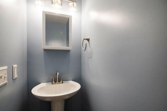 1185 Hideaway Valley Dr Unit 5, Harbor Springs, MI 49740 - bathroom featuring a sink