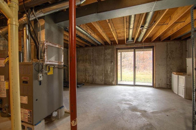 1185 Hideaway Valley Dr Unit 5, Harbor Springs, MI 49740 - below grade area featuring water heater and heating unit