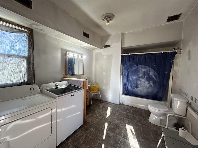 5157 Graham Rd, East Jordan, MI 49727 - clothes washing area with washer and clothes dryer, laundry area, and visible vents