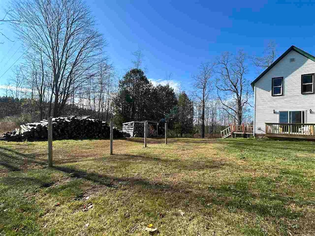 view of yard featuring a deck