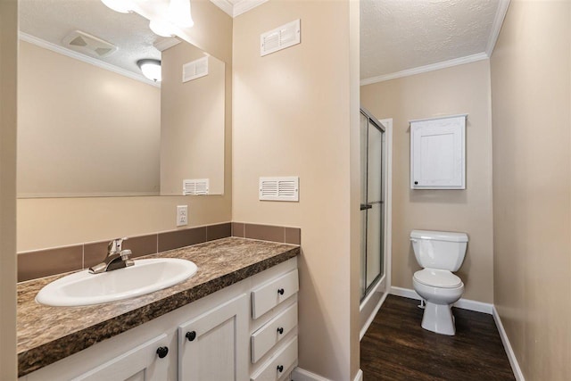 full bath featuring toilet, visible vents, a stall shower, and wood finished floors