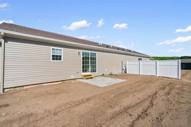 rear view of house featuring a patio