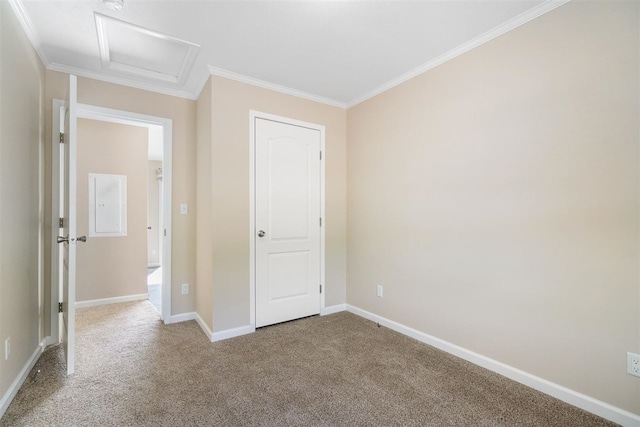 unfurnished bedroom featuring ornamental molding and carpet floors