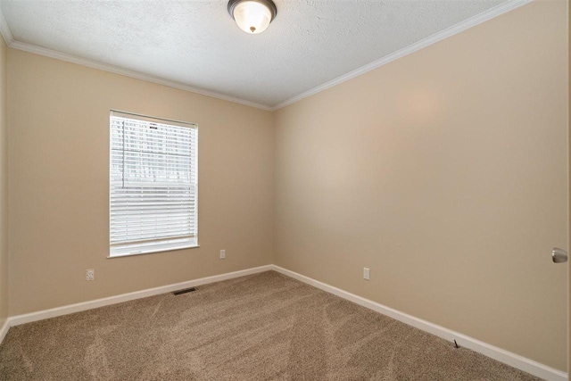 3911 Leslie Ln, Petoskey, MI 49770 - carpeted spare room with baseboards, ornamental molding, visible vents, and a textured ceiling