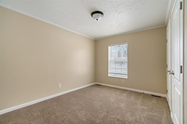 3911 Leslie Ln, Petoskey, MI 49770 - spare room with crown molding, baseboards, and carpet