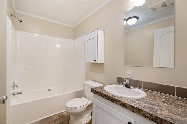 3911 Leslie Ln, Petoskey, MI 49770 - full bath featuring toilet, wood finished floors, crown molding, visible vents, and vanity