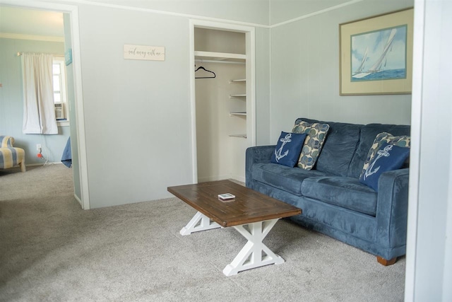 living room with ornamental molding and carpet floors