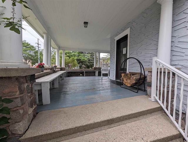 view of patio featuring a porch