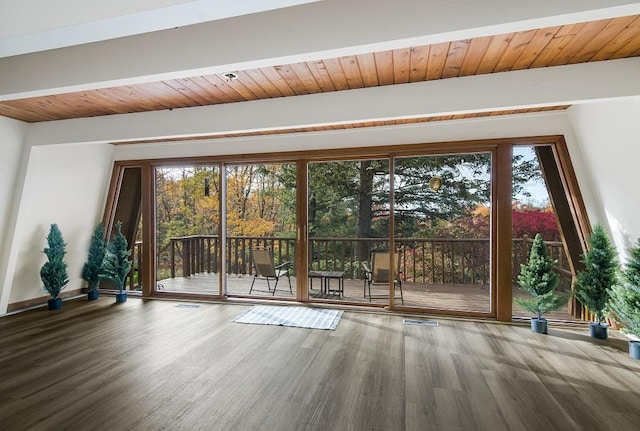 doorway to outside with wood-type flooring, wooden ceiling, and beam ceiling