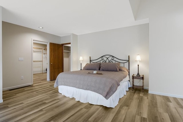 bedroom featuring light wood-type flooring