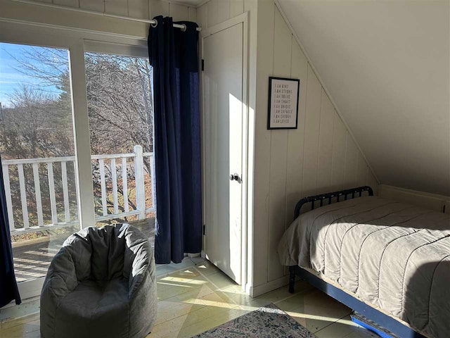 bedroom featuring multiple windows