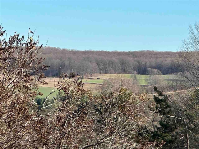 exterior space featuring a rural view