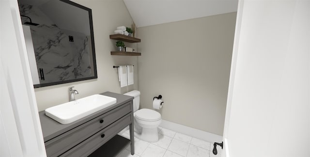 bathroom featuring tile patterned flooring, vanity, and toilet