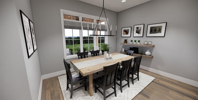 dining room with hardwood / wood-style floors