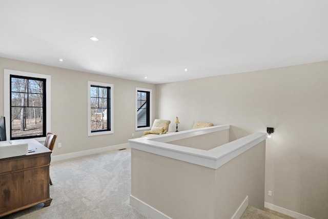 bedroom featuring light carpet