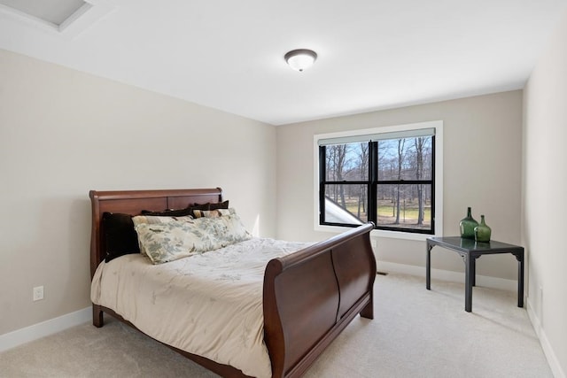 bedroom with light carpet