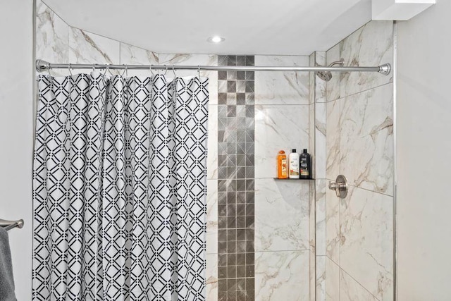 bathroom with curtained shower