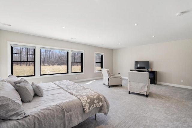 bedroom featuring light carpet