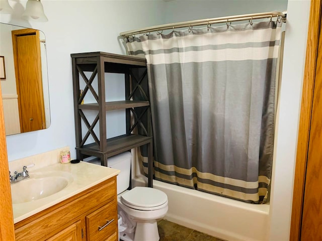 full bathroom with toilet, vanity, tile patterned floors, and shower / bath combo with shower curtain