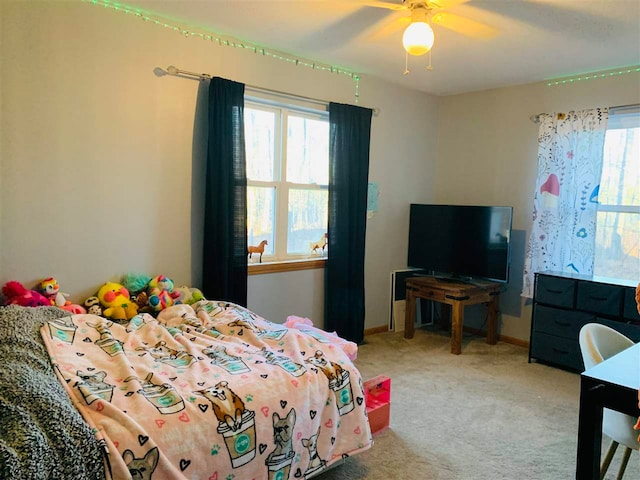 carpeted bedroom with ceiling fan