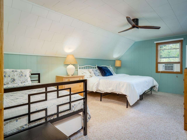 bedroom featuring carpet, ceiling fan, cooling unit, and vaulted ceiling