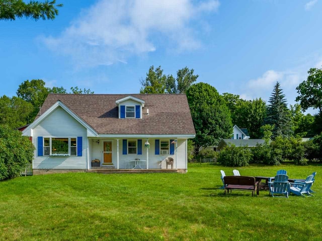 view of front of home with a front lawn and covered porch