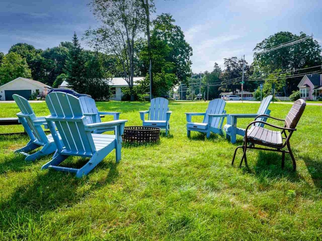 view of yard featuring a fire pit