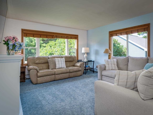 living room with carpet floors and a wealth of natural light