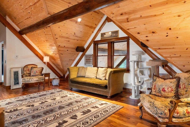 sitting room featuring vaulted ceiling with beams, hardwood / wood-style floors, and wood ceiling