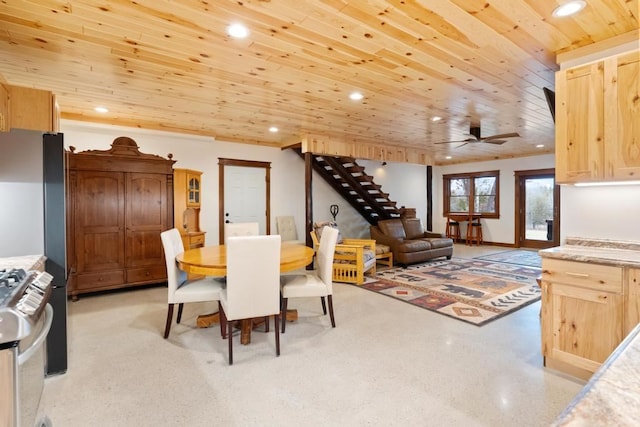 dining room with ceiling fan and wood ceiling