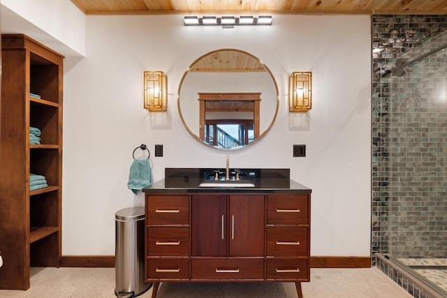 bathroom with vanity, a shower with shower door, and wooden ceiling