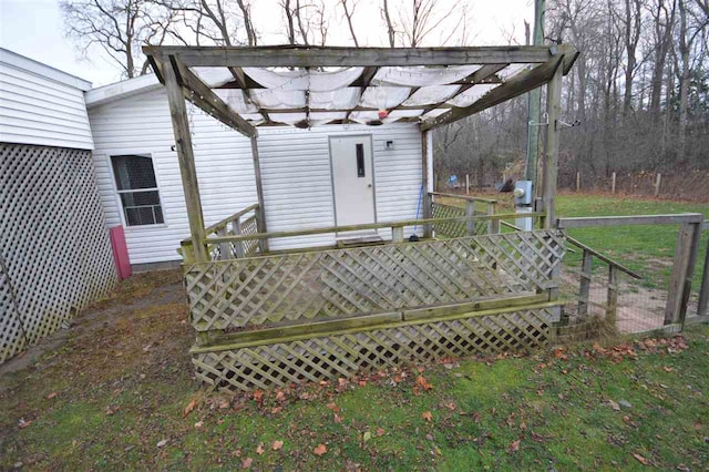 wooden terrace featuring a pergola