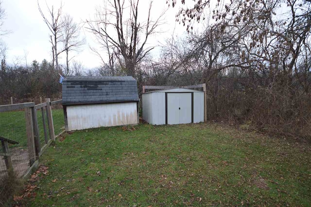 view of outbuilding featuring a yard