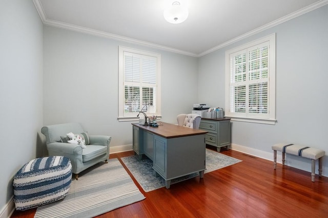 office with plenty of natural light, dark wood-type flooring, and ornamental molding