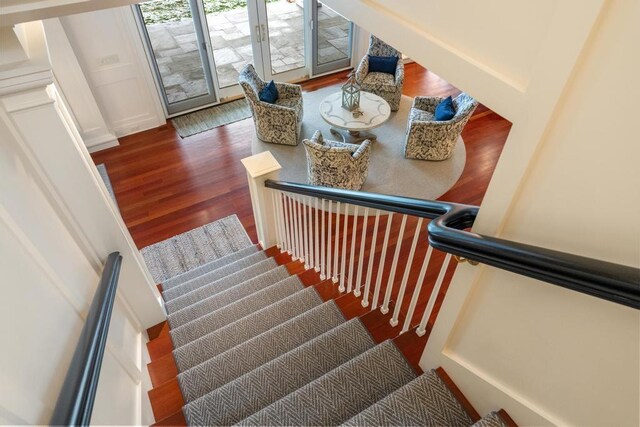 stairway with wood-type flooring