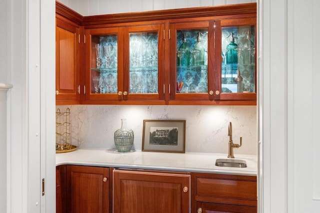 bar with decorative backsplash and sink