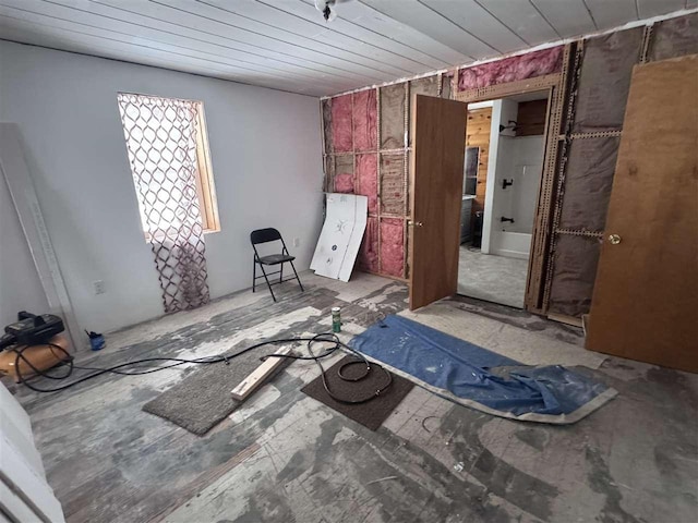 unfurnished bedroom with wooden ceiling