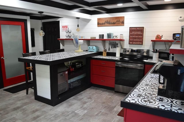 kitchen featuring stainless steel range with electric stovetop, pendant lighting, coffered ceiling, light wood-type flooring, and beam ceiling