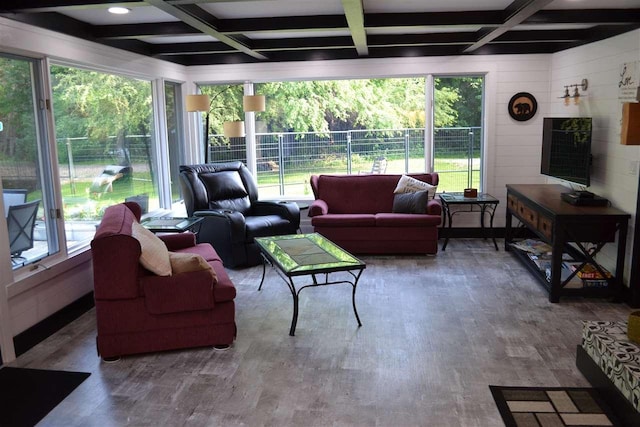 sunroom with a wealth of natural light, beamed ceiling, and coffered ceiling