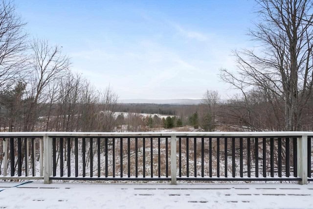 view of snow covered deck