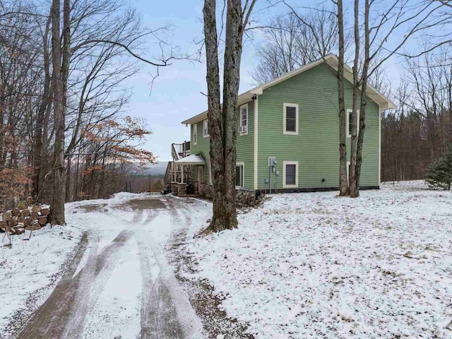 view of snow covered property