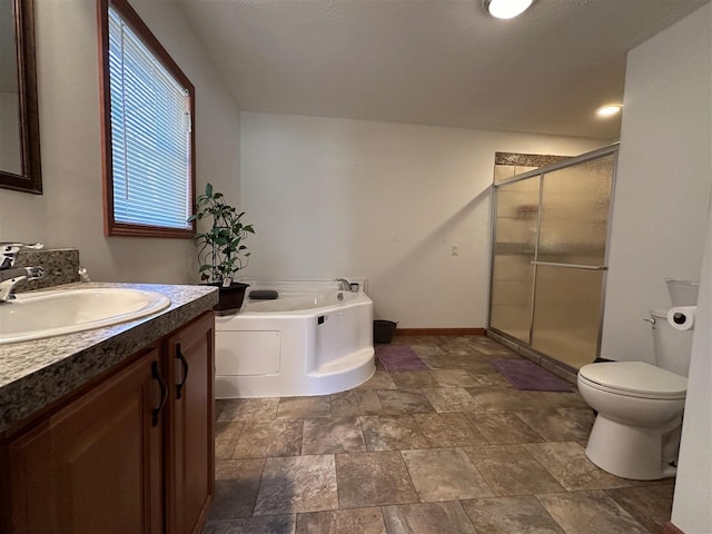 full bathroom featuring separate shower and tub, vanity, and toilet